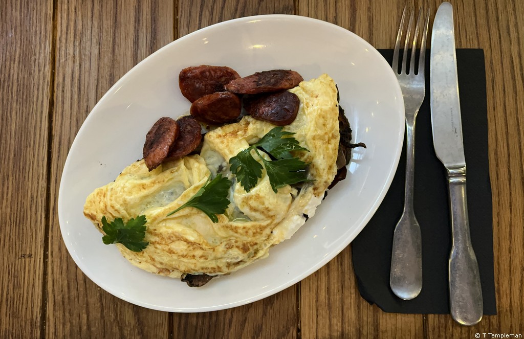Goat's cheese and mushroom omelette with a side of chorizo