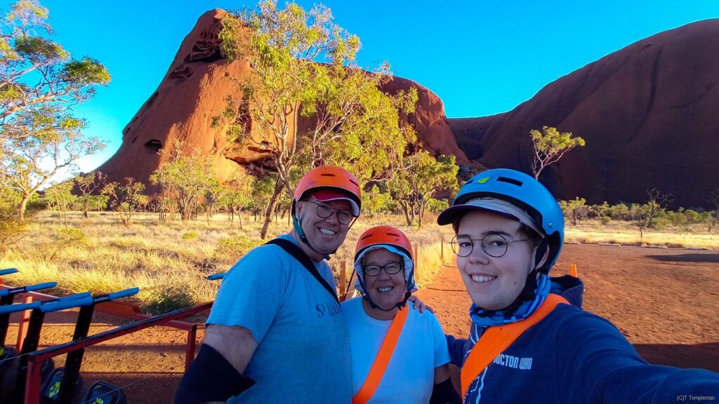 Happy family snap at the base of Uluru