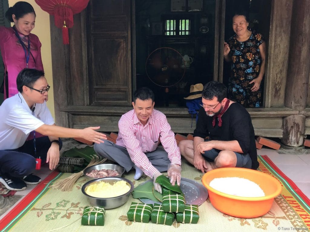 Learning how to make Banh Chung in Vietnam