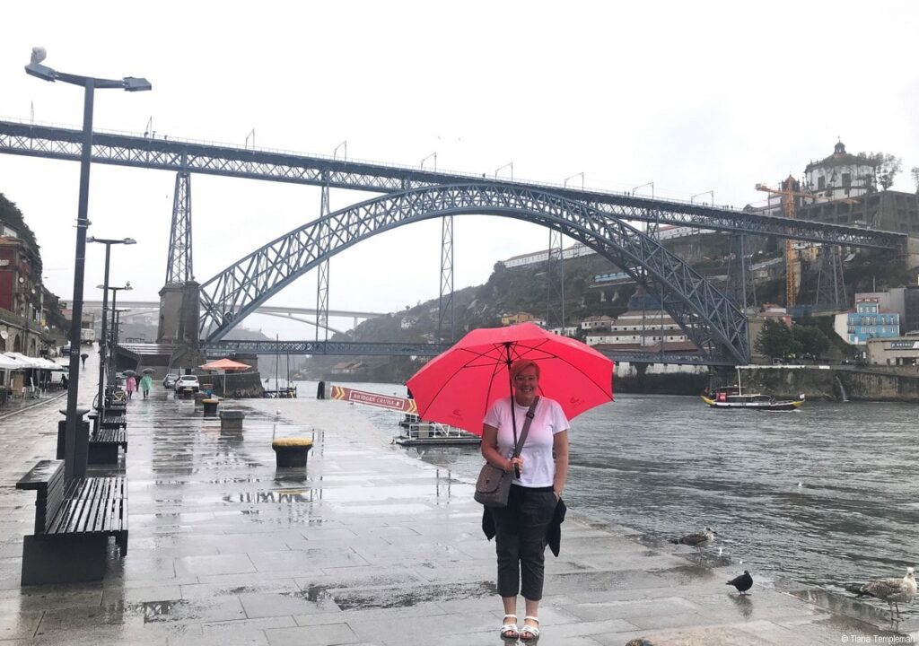 Woman with umbrella in Porto