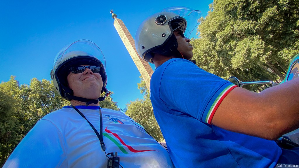 Happy pillion passenger as Rome flows past