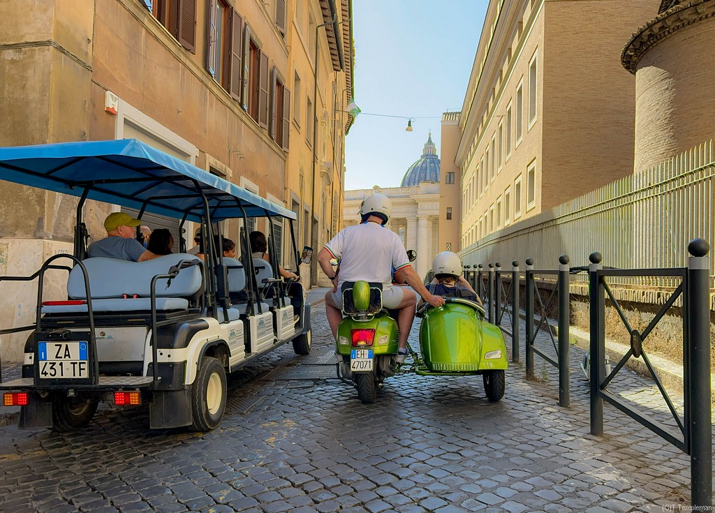Golf cart and Vespa in Rome