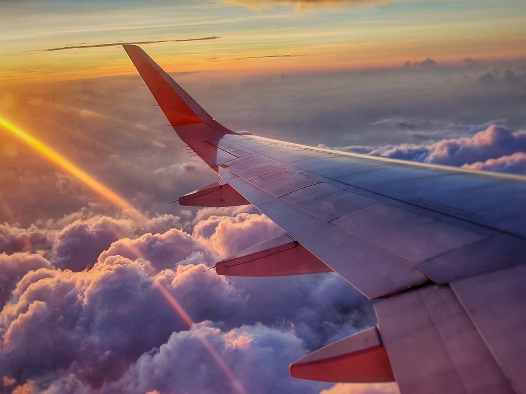 aeroplane flying through clouds